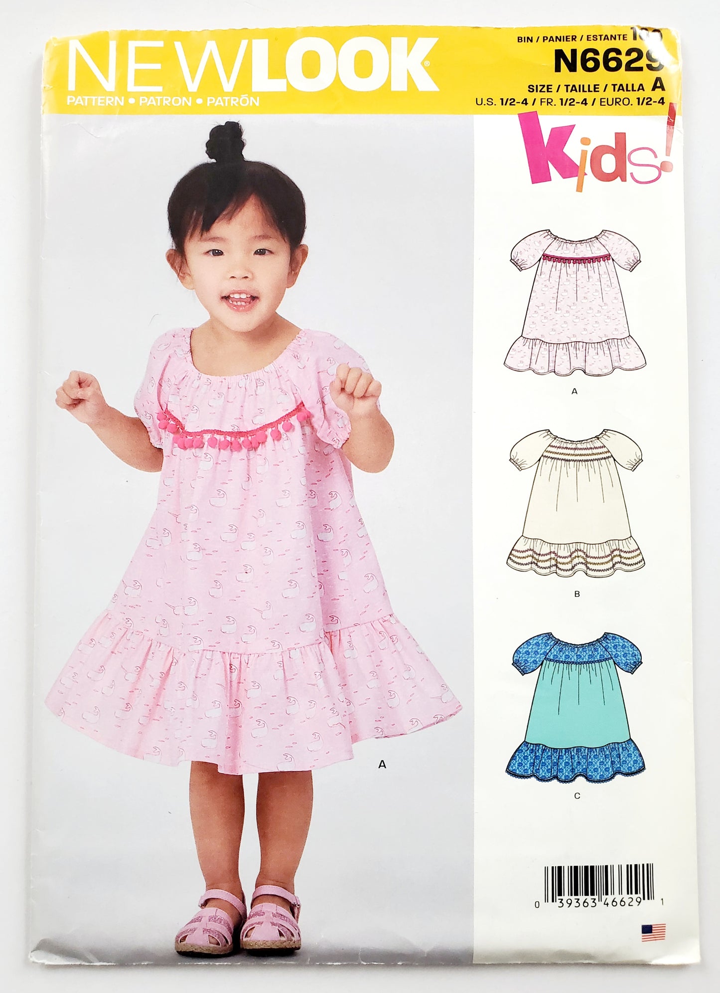NEW LOOK Sewing Pattern N6629 Kids Girls Toddler Dress with Cute Pom Pom Trim & Ruffles. Size 1/2 - 4 (Copy)