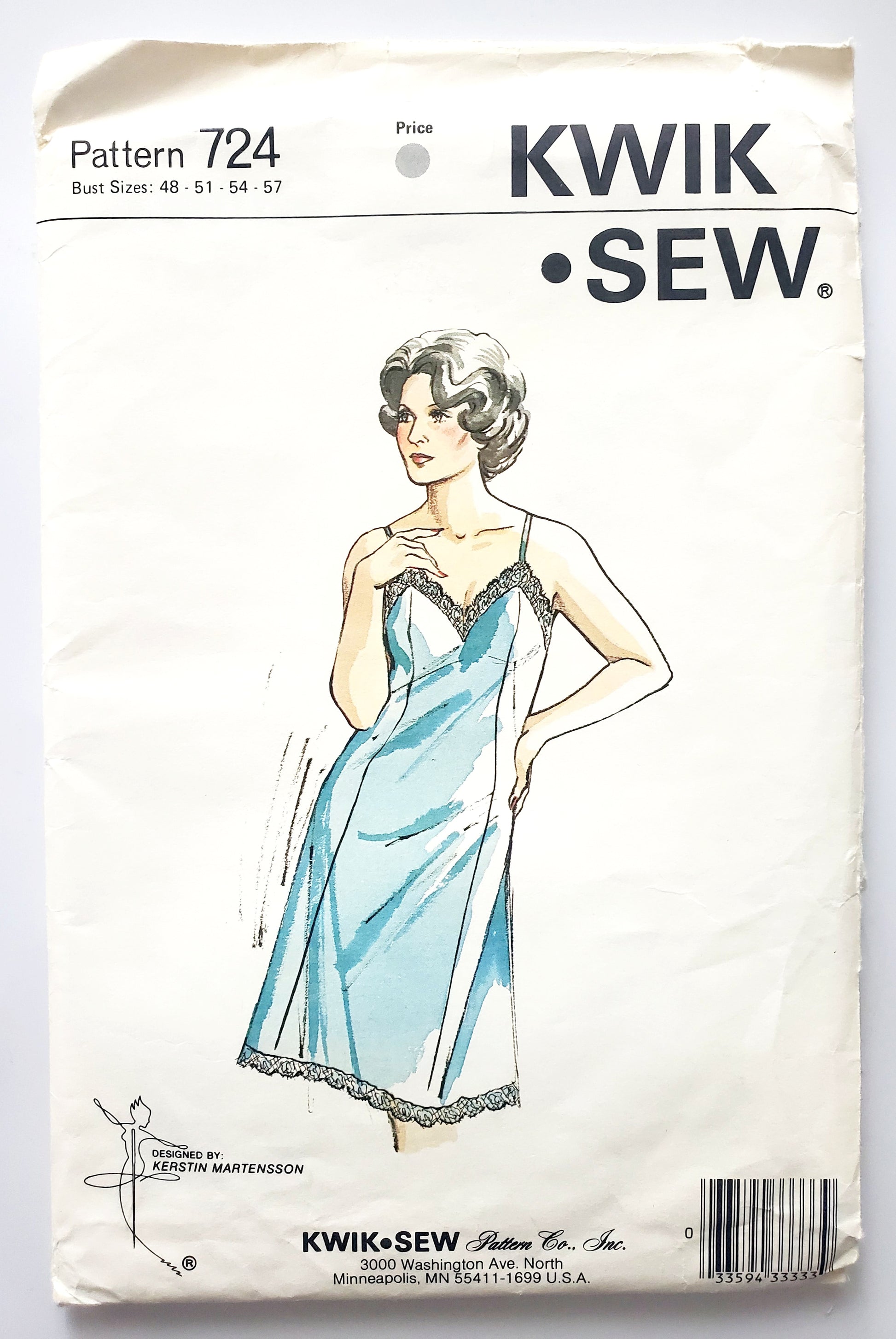 Kwik Sew Sewing Pattern 724 showing a women wearing a vintage slip dress with lace trim